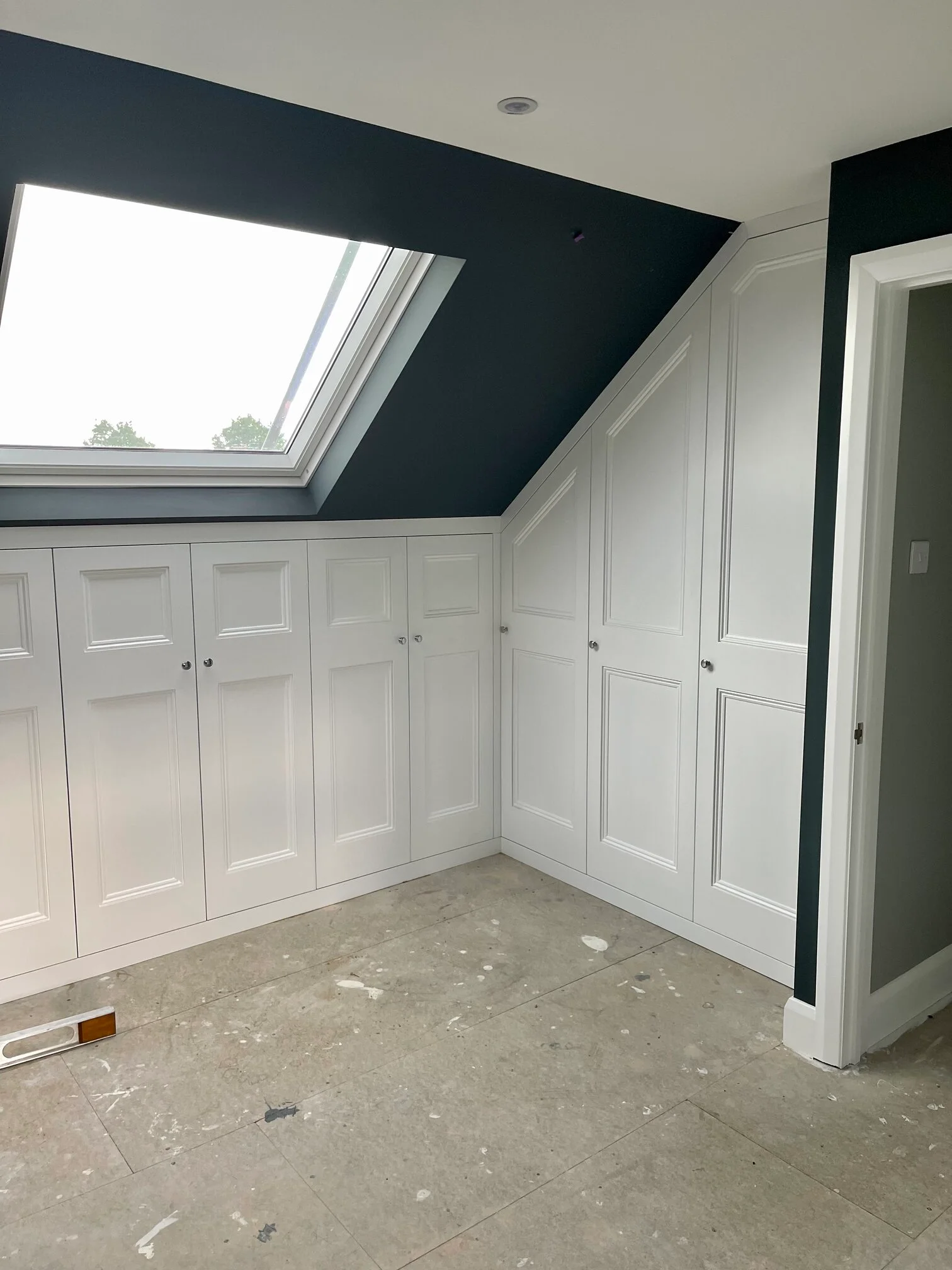 white alcove units in a bedroom