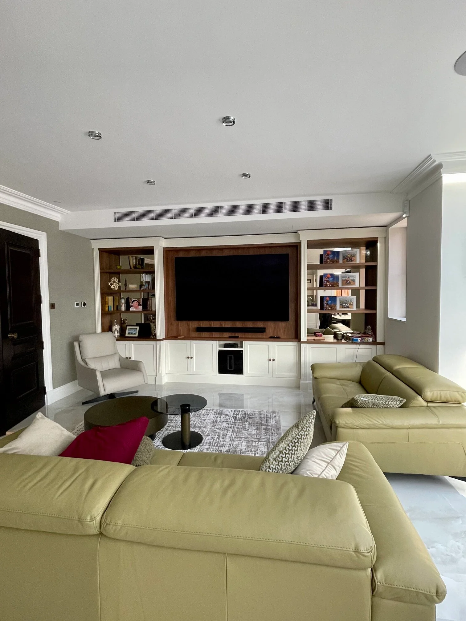 white wooden custom tv units in the living room