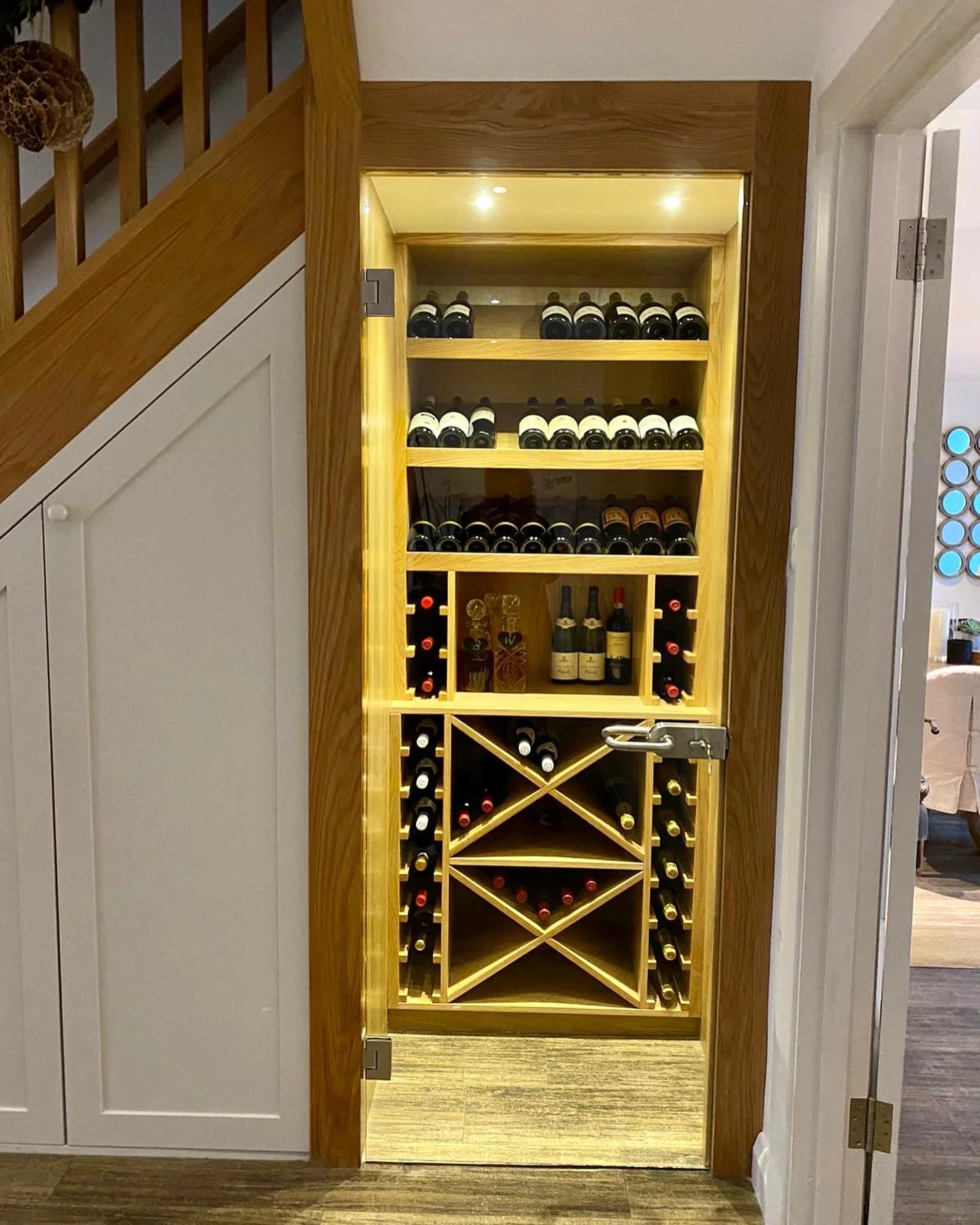 bespoke furniture wine cellar under stairs